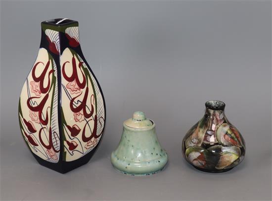 A Black Ryden vase, a Cobridge vase and a jar and cover tallest 21cm